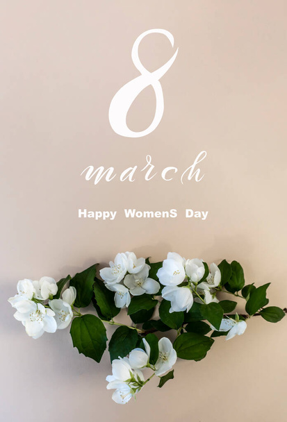 International Women's Day March 8! Flat Lay, banner, greeting card with flowers from March 8, Beautiful White Jasmine Flowers - Foto, imagen