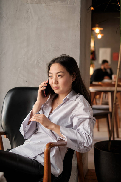 Asian woman on the phone - Photo, Image