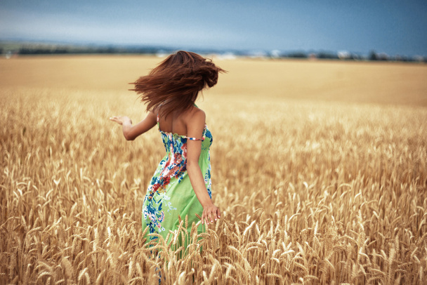 girl in wheat meadow - Фото, изображение