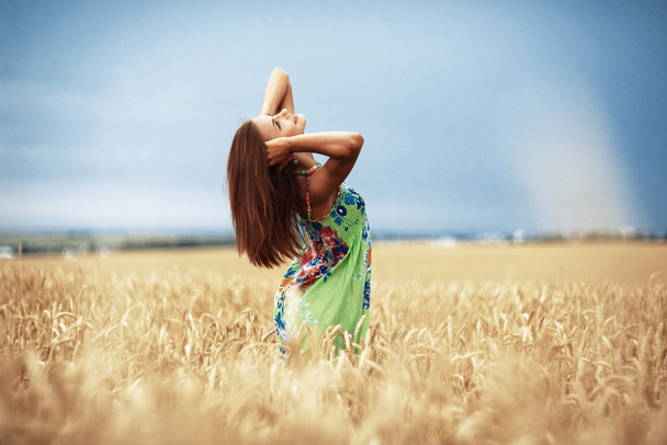 Girl in wheat meadow - Photo, Image