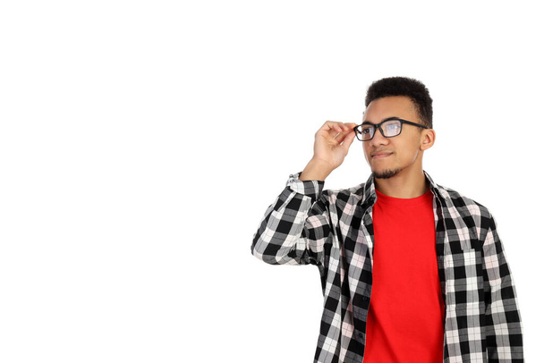 白い背景で隔離のメガネの若い男 - 写真・画像