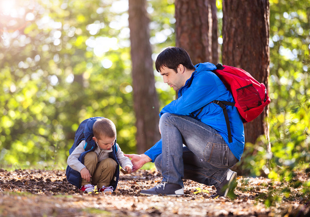 Father and son in the forest - Foto, imagen