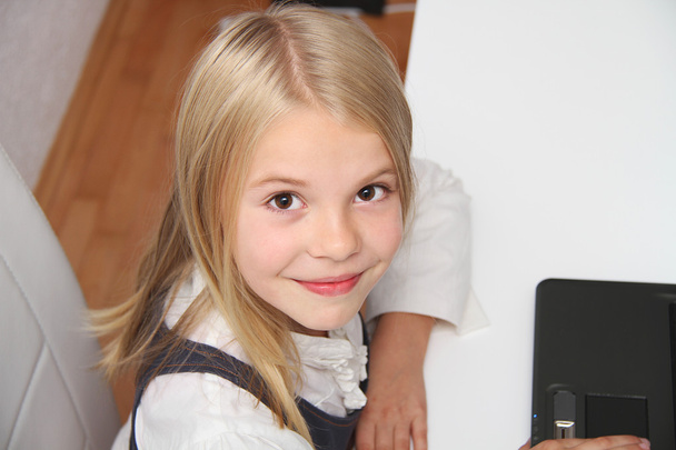 Young Girl Using Laptop At Home - Fotó, kép