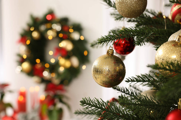 Christmas tree with beautiful decor indoors, closeup. Space for text - Photo, image