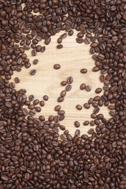 Caffe edition, coffee beans on a wooden background - Foto, Imagem