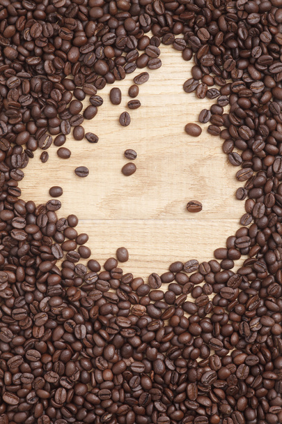 Caffe edition, coffee beans on a wooden background - Foto, Imagem