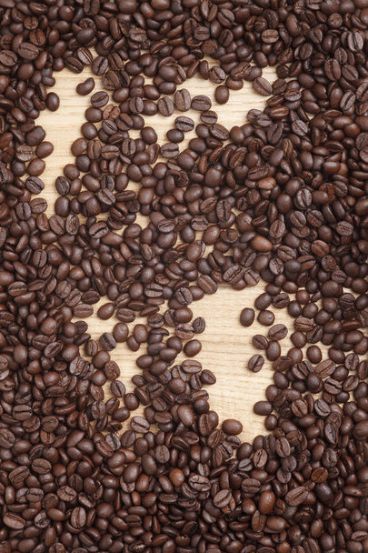 Caffe edition, coffee beans on a wooden background - Zdjęcie, obraz