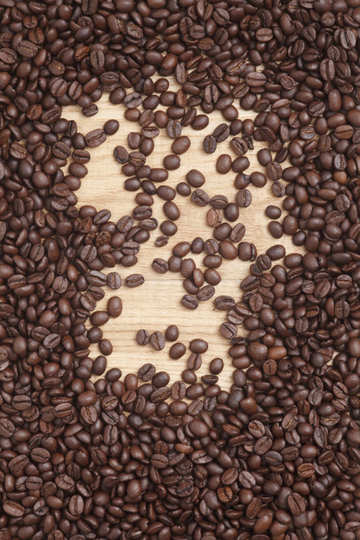 Caffe edition, coffee beans on a wooden background - Fotoğraf, Görsel