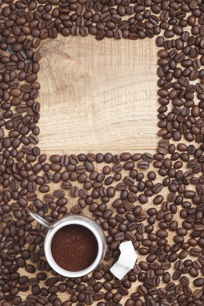 Caffe edition, coffee beans on a wooden background - Fotografie, Obrázek