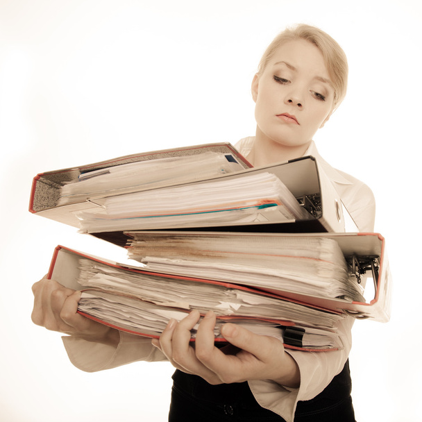 Businesswoman holding stack of documents - Photo, Image