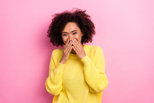 Photo of funny sweet woman dressed kitted pullover arms cover lips laughing isolated pink color background - Photo, image