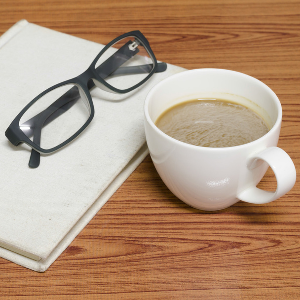coffee cup and notebook with glasses - Photo, Image