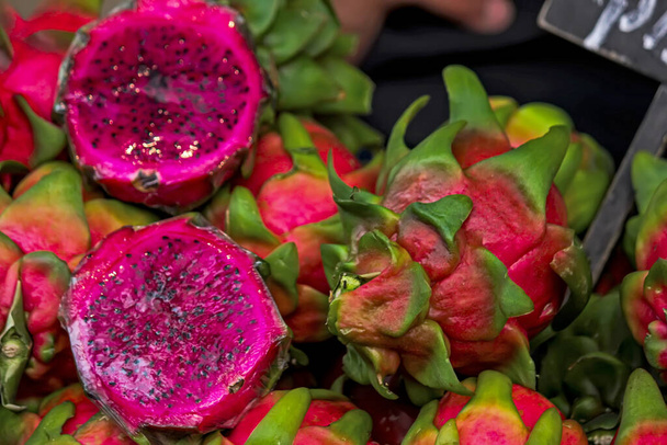 dragon fruits on a market stall - Photo, image