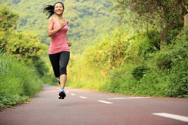 Young fitness woman running - 写真・画像