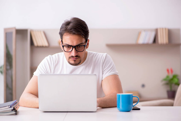 Young male freelancer working from home - Photo, Image