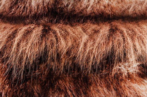 Toile de fond gros plan texture de fourrure d'animal de couleur marron. - Photo, image