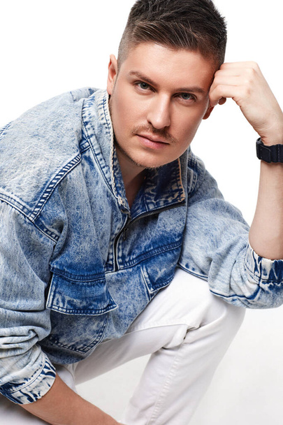 handsome young man in Jean jacket on white background - Fotografie, Obrázek