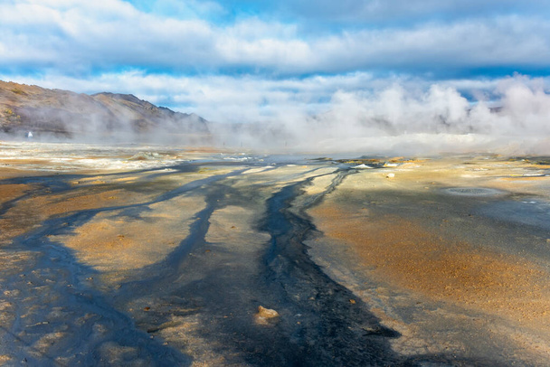 Fumarole field in Hverir geothermal zone Iceland. Famous tourist attraction - Foto, Imagen