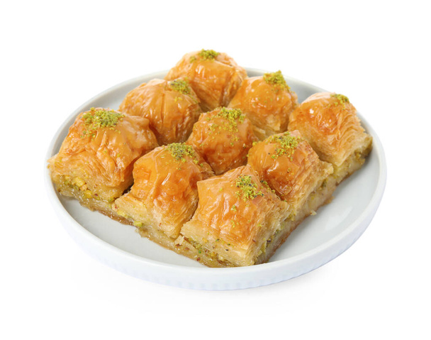 Delicious sweet baklava with pistachio nuts isolated on white - Photo, image