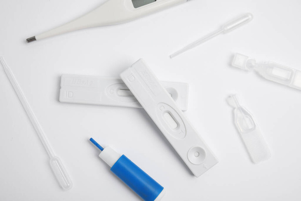 Disposable express test kit for hepatitis on white background, flat lay - Foto, Bild