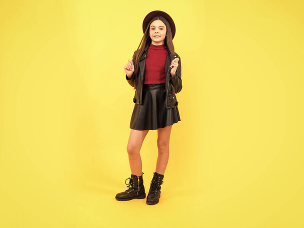 tween fashion look. childhood happiness. happy girl in leather wear. - Photo, Image
