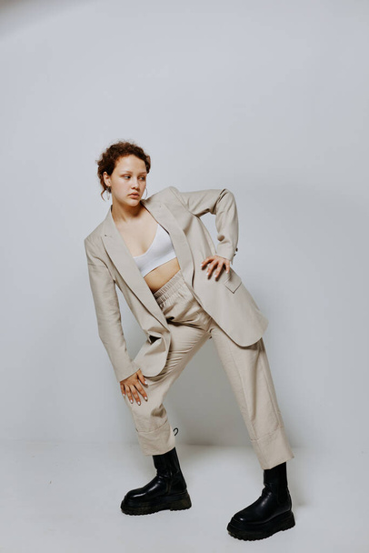 portrait of a young woman Clothes fitting elegant style suit fashion studio Lifestyle unaltered - Fotó, kép
