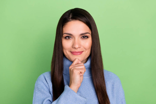 Photo of charming cute mature lady dressed blue pullover arm chin smiling isolated green color background - Фото, зображення