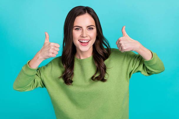 Photo of positive charming lady two hands demonstrate thumb up isolated on turquoise color background - Valokuva, kuva