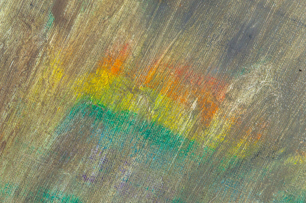 abstract vervaagde veelkleurige achtergrond als gevolg van het afwassen van verf van doek, korte focus. Geen kunstvoorwerp, tijdelijk effect. - Foto, afbeelding