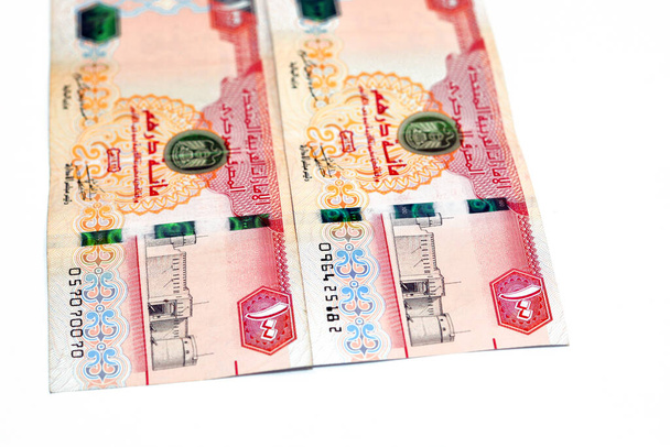 Obverse side of 100 AED 100 Dirhams bankjegy az Egyesült Arab Emírségek, valuta az Egyesült Arab Emírségek egy kép Al Fahidi erőd és századik évfordulója EAE alapító atya Sheikh Zayed elszigetelt fehér - Fotó, kép