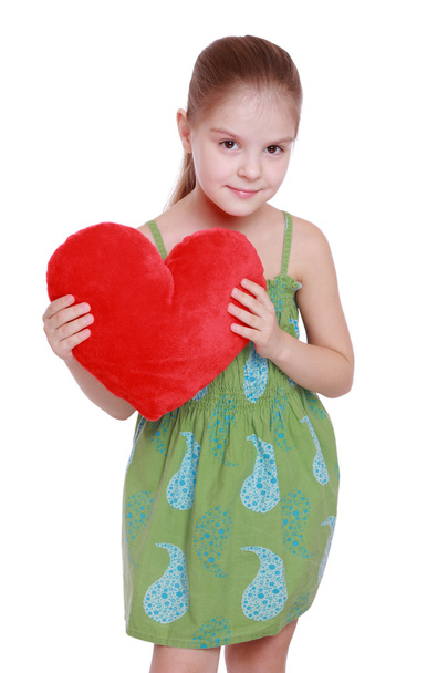 Beautiful kid with heart symbol - Фото, изображение