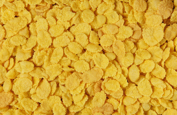 Corn flakes background. Close up top view. - Фото, зображення