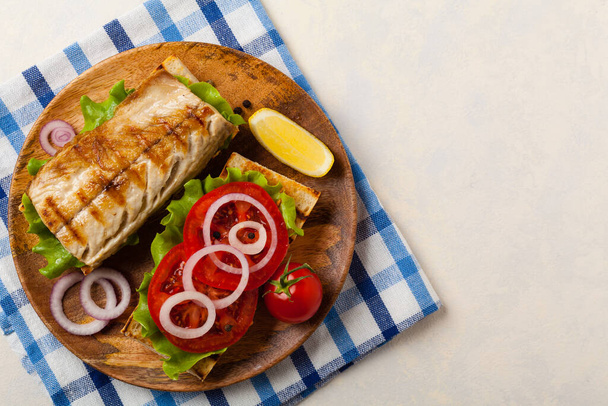 Traditional Turkish sandwich with a scorched mackerel - 写真・画像