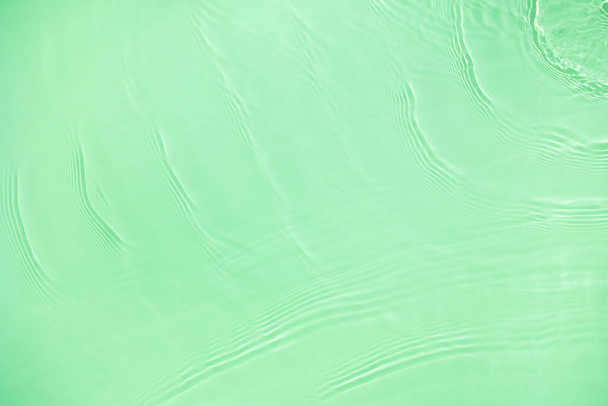 transparent green colored clear calm water surface texture  - Photo, Image