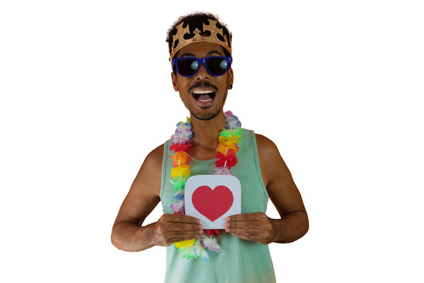 Black man in costume for brazil carnival holding like button isolated on white. African man in various poses and expressions. - Φωτογραφία, εικόνα