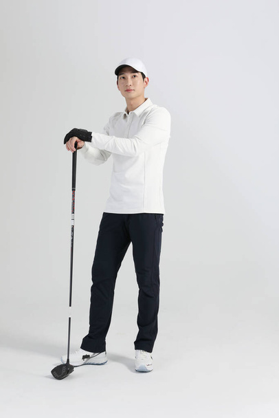 golf sports player, asian korean man with golf club in studio - Photo, Image