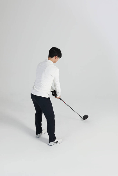 golf sports player, asian korean man with golf club in studio - Фото, зображення