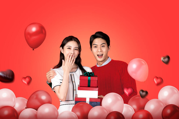 Valentines day poster Asian Korean couple with gift boxes and balloons - Фото, изображение