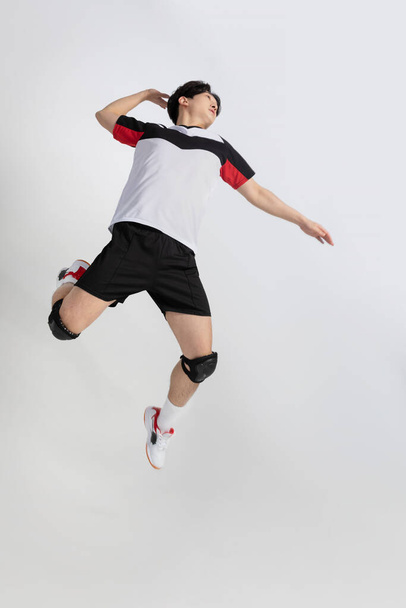 volleyball sports player, asian korean man with spike, spiking attack motion - Foto, afbeelding