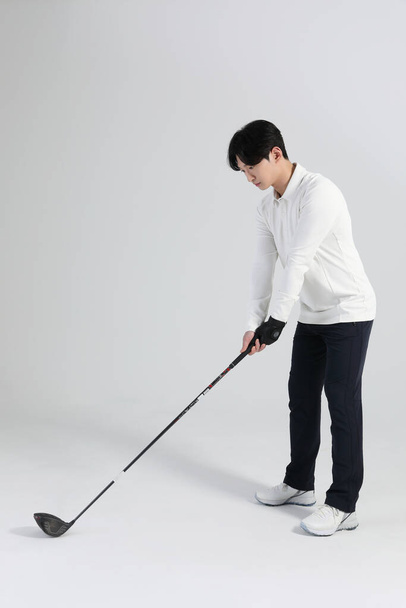 golf sports player, asian korean man with golf club in studio - Zdjęcie, obraz