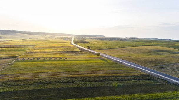 Aerial shot of car on the road from drone point of view - Fotografie, Obrázek