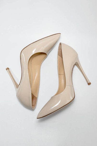 Nude beige high heeled womens shoes. View from above. - Photo, Image