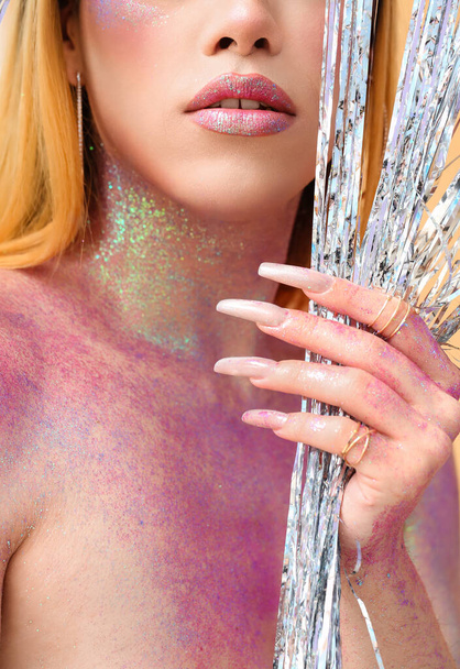 Fashionable young transgender woman with glitters on body, closeup - Фото, зображення