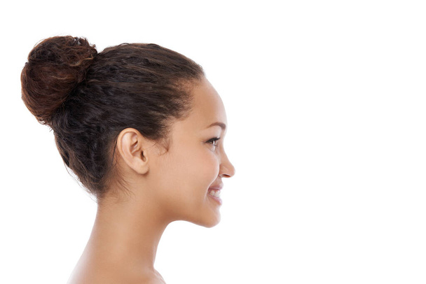 The perfect bun. Profile of a beautiful young ethnic woman. - Photo, Image