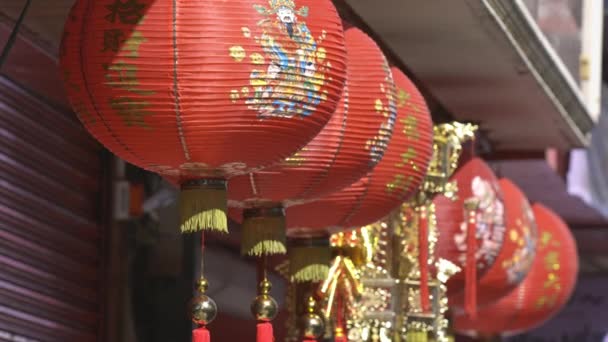Chinese new year lanterns in old town area.  Chinese alphabet on lantern meaning good fortune healthy and wealth. - Footage, Video