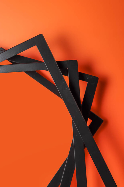 Set of automotive display panel frames stacked one over the other on orange background - Фото, зображення