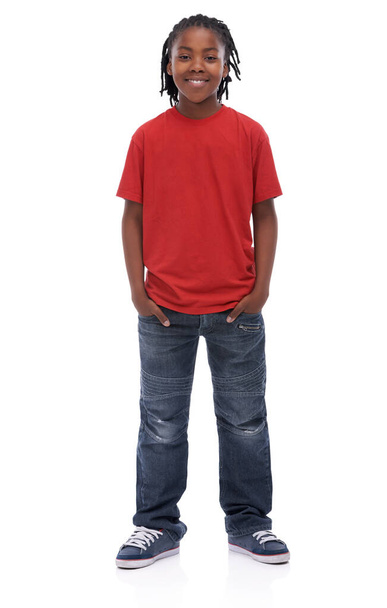 Stylin little dude. A young African boy standing with his hands in his pockets smiling at the camera. - Foto, Imagen