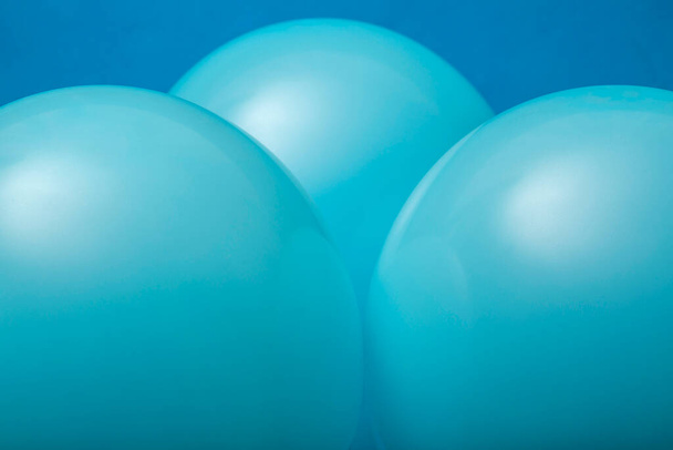 Abstract background of three inflated blue balloons - Foto, Bild
