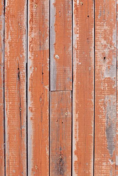 Fragment of a pale orange, old wall from boards in full screen. - Φωτογραφία, εικόνα