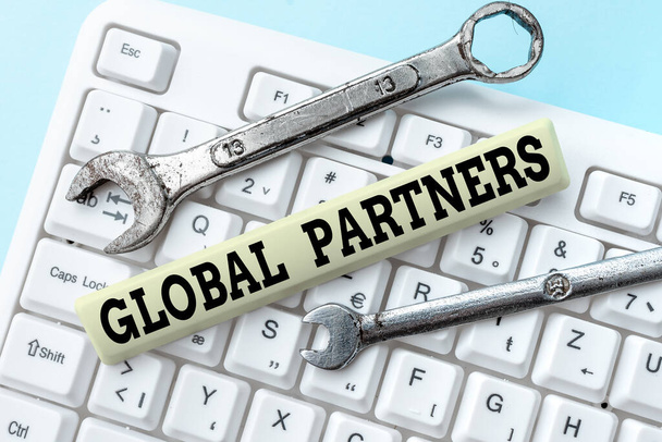 Sign displaying Global Partners. Conceptual photo Two or more firms from different countries work as a team Abstract Typing New Antivirus Program, Typing Internet Virus Lists - Photo, Image